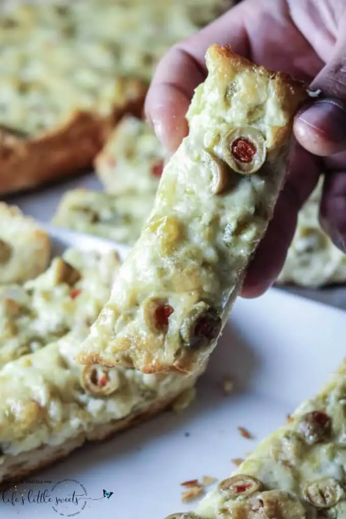 Green olives (which are my favorite), two kinds of cheese, butter, green chiles… and, oh yes, jalapeños. #greenchiles #bread #appetizer #cheese #butter #jalapeños