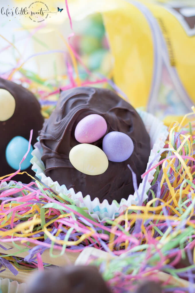 Chocolate Peanut Butter Eggs are a homemade, no bake, sweet, dessert candy and are perfect for Spring and Easter season! They are made with simple pantry staples and are decorated with M&M'S® Pastel Peanut Chocolate Candy from Sam's Club. Try this easy and fun recipe today! #SpringMoments #CollectiveBias #ad @mmschocolate @samsclub #chocolate #peanutbutter #Easter #Spring #candy #Springtime #Eastereggs #recipe #food #sweet #dessert