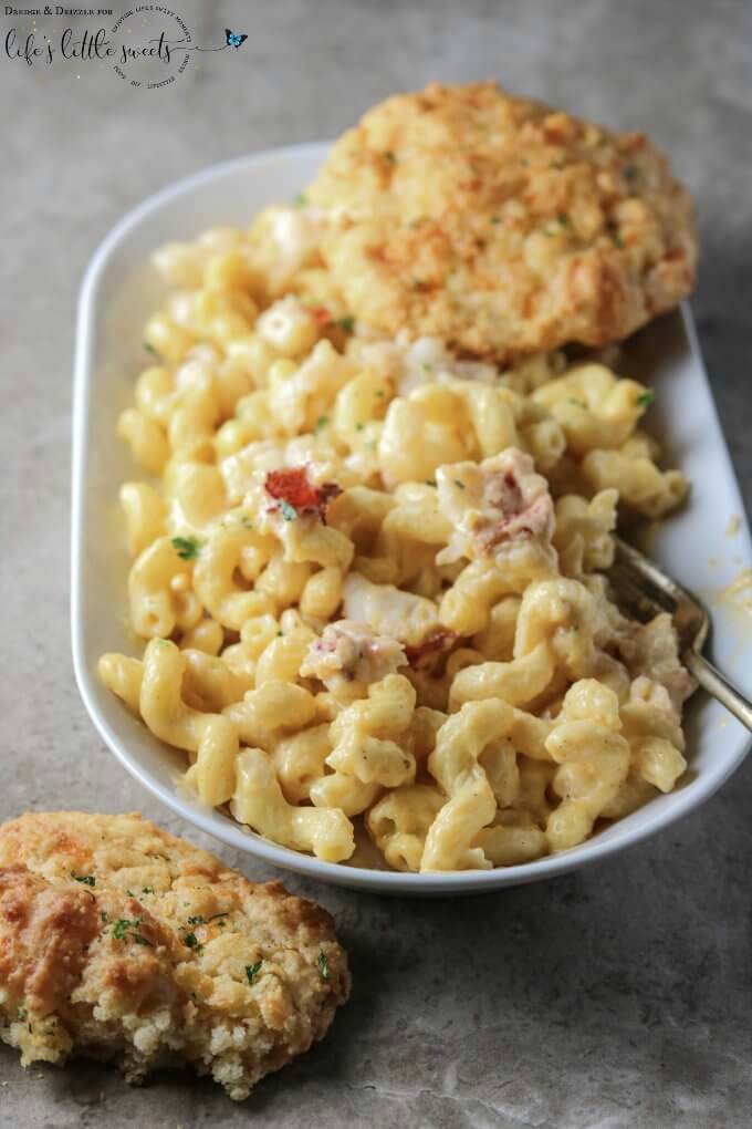 Looking to bring the ocean to your family's dinner table? This Lobster Macaroni & Cheese is creamy and warm and buttery with a hint of Old Bay seasoning... a huge crowd-pleaser! #lobster #pasta #macncheese #seafood #cheese #recipe #macaroni