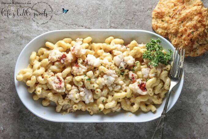 Looking to bring the ocean to your family's dinner table? This Lobster Macaroni & Cheese is creamy and warm and buttery with a hint of Old Bay seasoning... a huge crowd-pleaser! #lobster #pasta #macncheese #seafood #cheese #recipe #macaroni