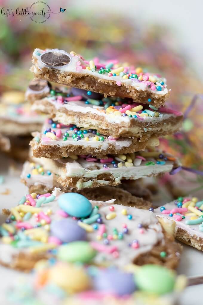 Try this Easter Saltine Toffee recipe this Spring! This classic, Saltine Toffee is an simple to make recipe, using simple pantry ingredients, white chocolate, Easter-themed, pastel sprinkles and your favorite candies. #Easter #sprinkles #candy #Saltines #whitechocolate #chocolate #candy #homemade #easy #brownsugar