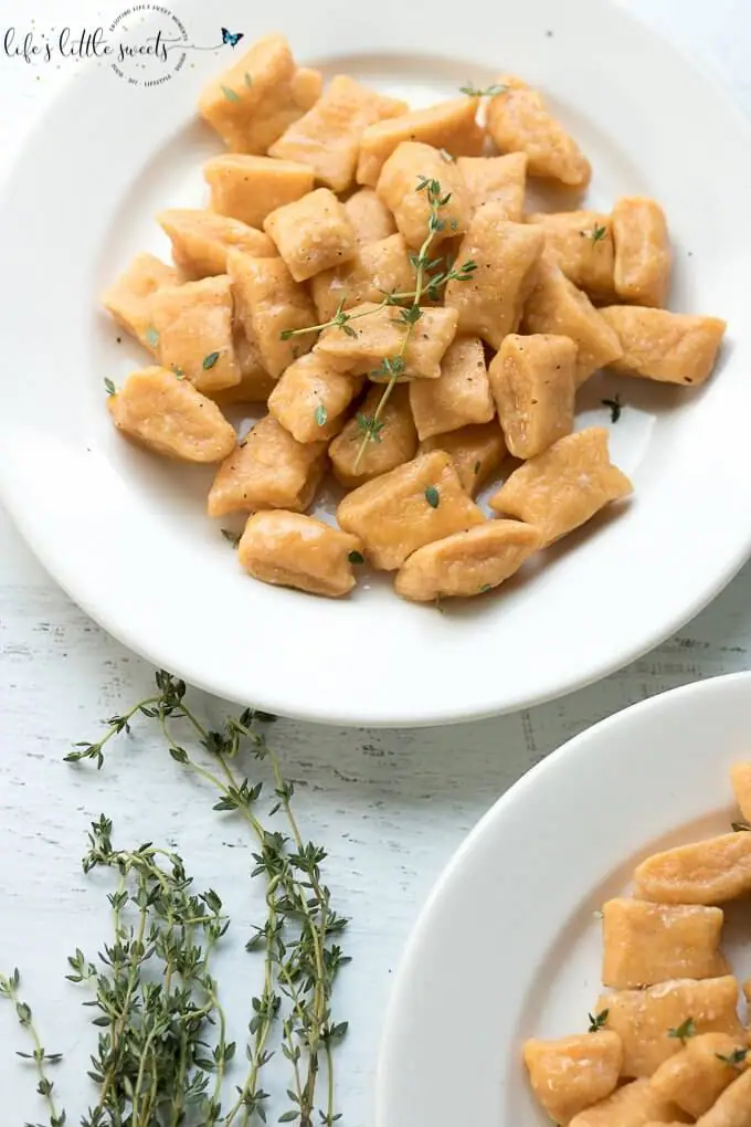 This Sweet Potato Gnocchi is surprisingly easy to put together. There are only 3-4 required ingredients and you can add some fresh herbs, like thyme or parsley for serving. Try this simple, homemade dish for your next meal! (dairy-free, vegetarian) #sweetpotatognocchi #gnocchi #sweetpotatoes #sweetpotato #Italianfood #recipe #homemade #thyme #egg #flour