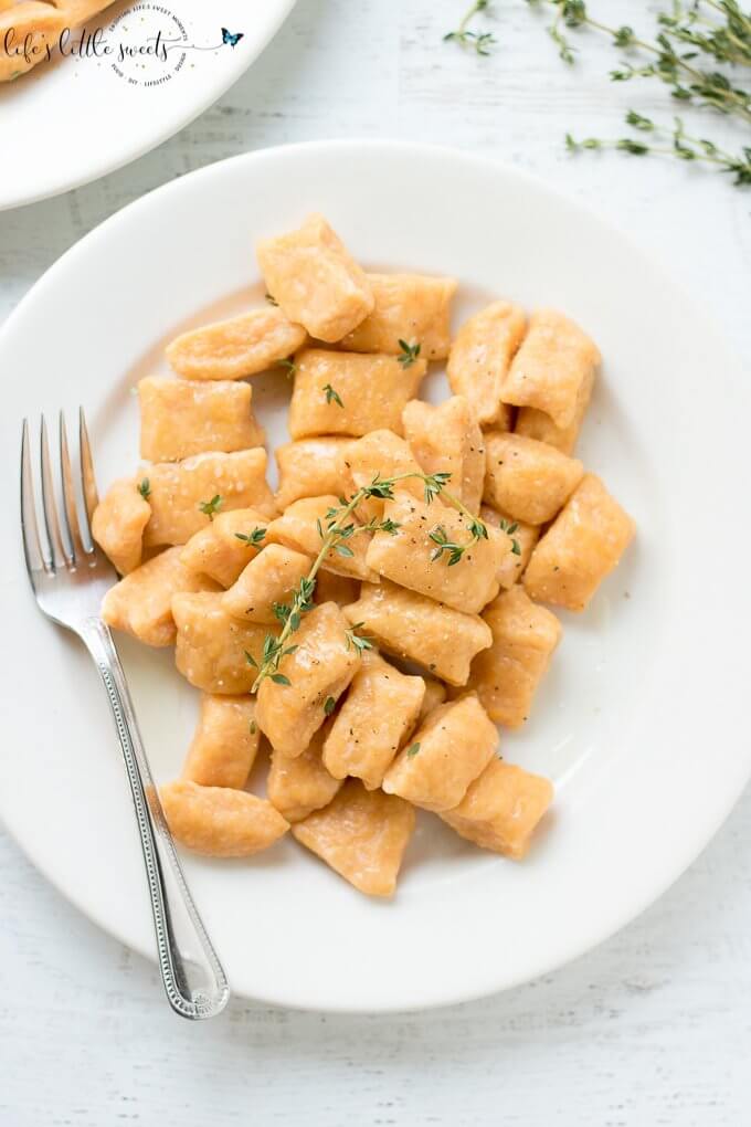 This Sweet Potato Gnocchi is surprisingly easy to put together. There are only 3-4 required ingredients and you can add some fresh herbs, like thyme or parsley for serving. Try this simple, homemade dish for your next meal! (dairy-free, vegetarian) #dairyfree #vegetarian #thyme #sweetpotatoes #sweetpotato #flour #egg #gnocchi #recipe #homemade