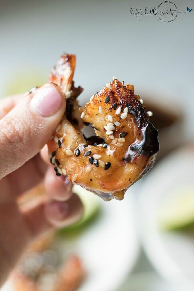Grilled Teriyaki Sesame Shrimp uses fresh jumbo shrimp and a homemade teriyaki sauce. It’s perfect as an appetizer for outdoor entertaining or on its own over rice as a weeknight meal. This shrimp on a stick is finger-licking good! #ad #sofabfood @sofabfood #shrimp #seafood #teriyaki #grilled #asian #food #recipe #bbq