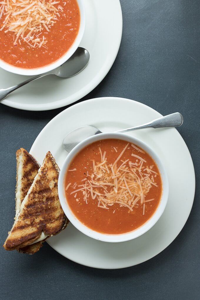 Just like mom used to make only better because the soup doesn’t come out of a can, this healthy comfort food is a deli-style meal you’ll love. Homemade Tomato Soup and Grilled Cheese is exactly the 30-minute meal your lunchtime needs! #ad #SoFabFood @SoFabFood #grilledcheese #tomatosoup #cheese #homemade #recipe #soup