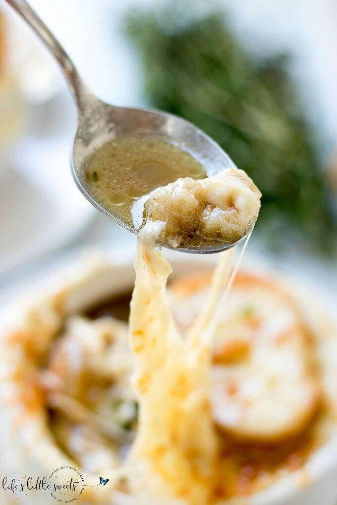 This Homemade French Onion Soup recipe has the flavors of a classic French onion soup that you would find at a restaurant, yet, it is easy to prepare in your home kitchen. Caramelized onions in a reduction of white wine and sherry with herbs of thyme and bay leaves in a clear beef broth make this soup delicious. #onions #Frenchonionsoup #cheese #recipe #Frenchbread #homemade #thyme #garlic #Muentser #Swiss