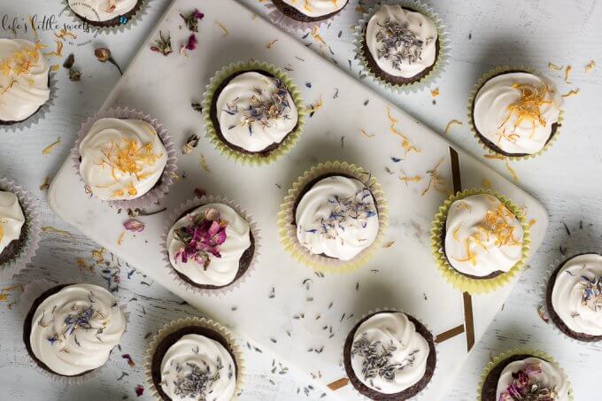 Dairy Free Chocolate Cupcakes topped with dried flowers (overhead view)