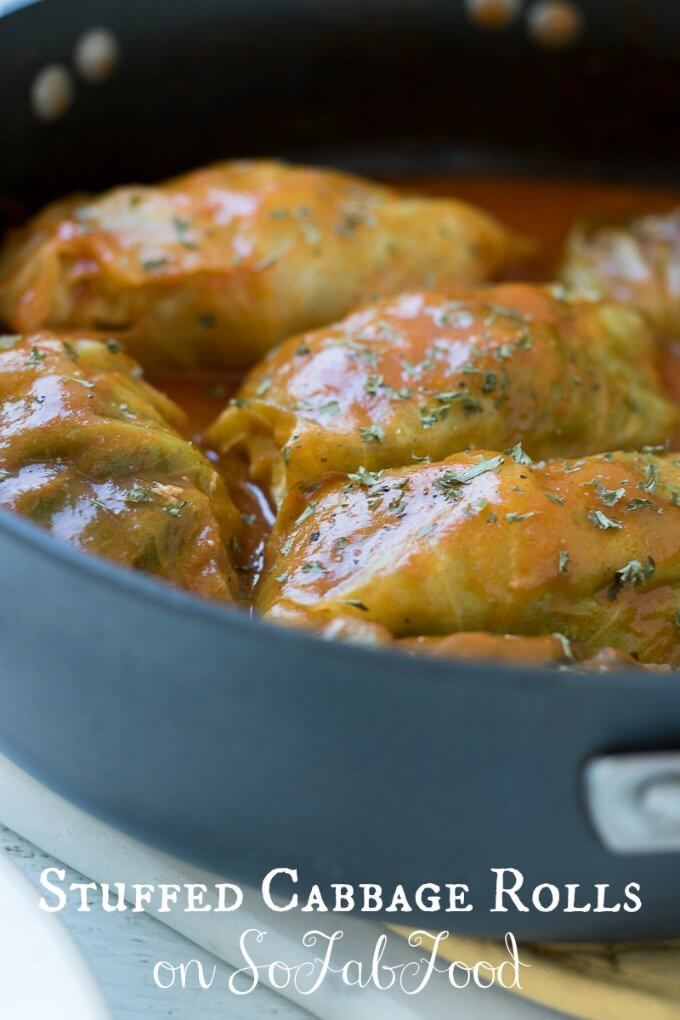 Stuffed Cabbage Rolls on SoFabFood - Filled with either lean ground turkey or beef, these Stuffed Cabbage Rolls are served with a tomato sauce and are sure to impress a dinner crowd. This simple weeknight meal is popular in Eastern Europe, the Mediterranean, and parts of Asia. This classic comfort food is a hit every time! #cabbagerolls #cabbage #turkey #recipe #homemade #tomatosoup #recipe