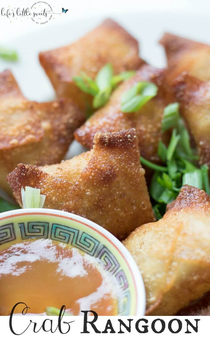 This Crab Rangoon recipe lets you have all the flavors of this popular Chinese-American takeout appetizer - at home. This recipe is fried parcels, filled with cream cheese, crab meat, garlic powder, Worcestershire sauce, topped with green onion (scallions) and served with a sweet, duck sauce for dipping. #recipe #crabrangoon #homemade #chinesetakeout #creamcheese #greenonion #ducksauce #fried #garlicpowder #appetizer