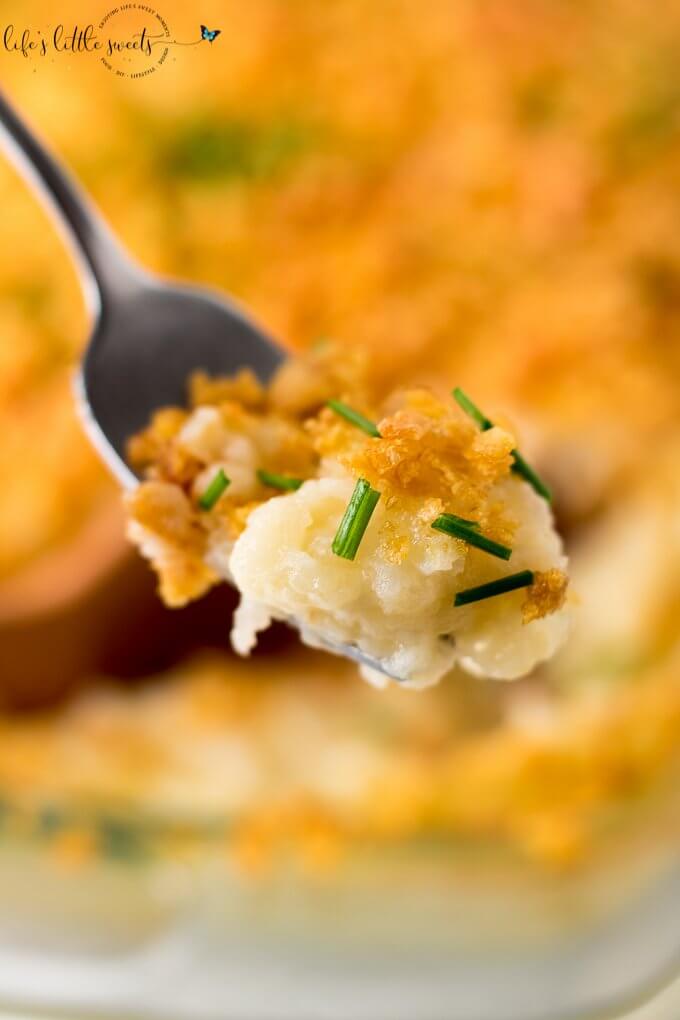 Funeral Potatoes are a cheesy funeral potatoes casserole recipe that feeds all your cravings. Perfect for any nights dinner, special occasions and any gathering with hungry stomachs. #funeralpotatoes #potatoes #chives #cheese #hashbrowns #cornflakes #casserole 