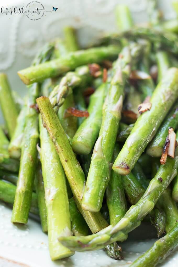 Sautéed Garlic Asparagus is a perfect Springtime vegetable side dish. It cooks up in minutes, it’s savory and pairs nicely with fish, meat or grains. (gluten-free, vegan) #vegan #glutenfree #recipe #homemade #garlic #asparagus #Spring #sautéed