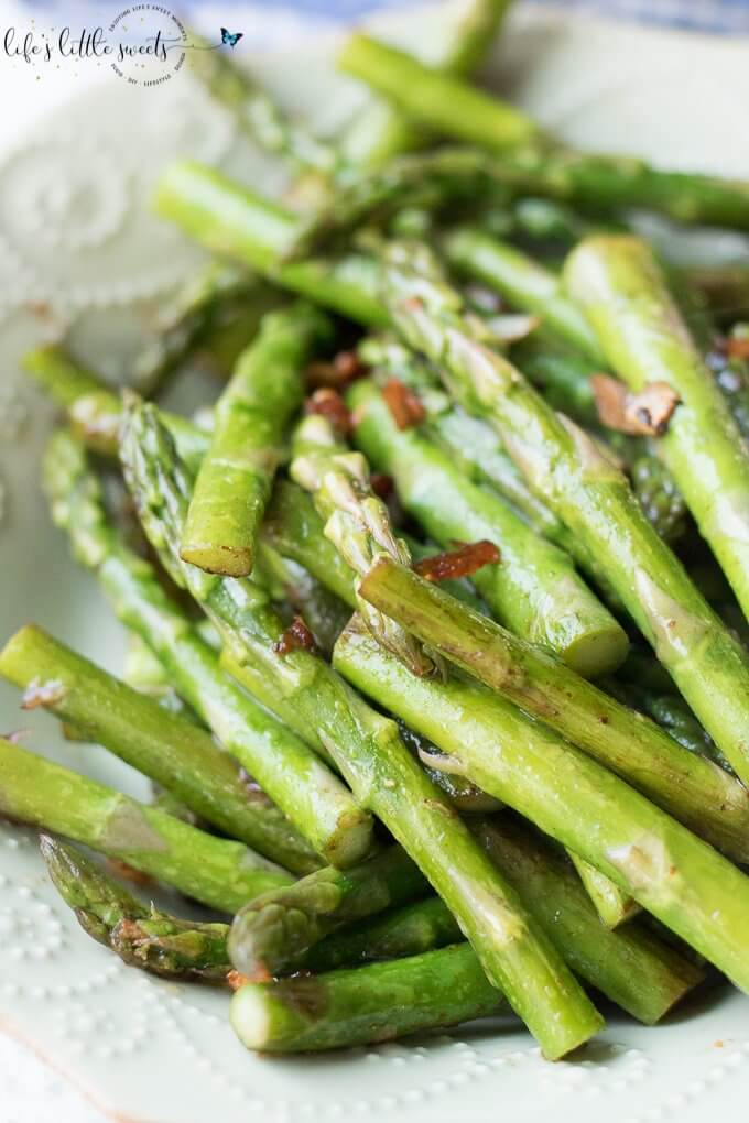 Sautéed Garlic Asparagus is a perfect Springtime vegetable side dish. It cooks up in minutes, it’s savory and pairs nicely with fish, meat or grains. (gluten-free, vegan) #vegan #glutenfree #recipe #homemade #garlic #asparagus #Spring #sautéed