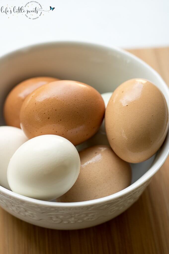 Medium Boiled Eggs - These eggs are perfect, sliced in half for serving on top of Ramen bowls or if you just prefer your eggs boiled to a medium consistency. Check out my trick for using and peeling farm fresh eggs. #eggs #egg #how #recipe #food #Ramenbowls #ingredient