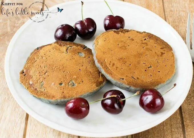 These soft, fluffy and nutritious Cherry Oatmeal Pancakes are delectable to the taste buds. These pancakes are made with real ingredients and are super easy to make. In just few minutes a mouthwatering and family friendly breakfast/brunch gets ready. These pancakes are worth devouring every bite and you would crave for more. #vegan #pancakes #cherries #oatmeal #breakfast #oatflour