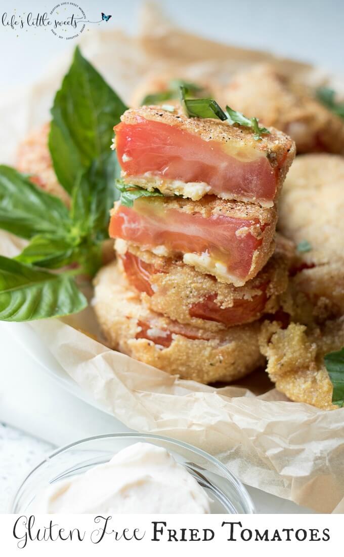 Gluten Free Fried Tomatoes are a delicious Summer appetizer or vegetarian side dish - juicy, ripe, red tomatoes with a gluten free flour, egg, milk and corn flour coating fried in Canola oil make for a crispy outer texture, sprinkle with fresh basil! #tomatoes #cornmeal #glutenfree #fried #canolaoil #appetizer #tomatoseason #friedtomatoes #basil