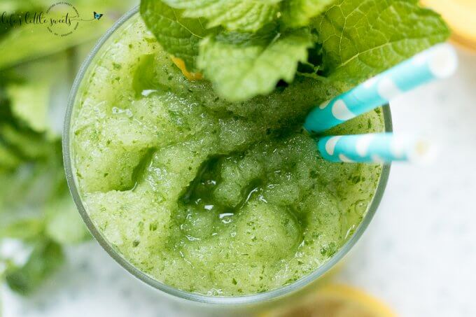 Frozen Mint Lemonade, also called Limonana (a Middle Eastern Frozen Mint Lemonade) is one of the MOST refreshing drinks of the Summer months. If it's hot and you need to cool down fast with a sweet and sour, frozen drink - this is it! (vegan, gluten free) #frozen #drink #slushie #limonana #lemonade #mint #spearmint #freshmint #Summerdrinks