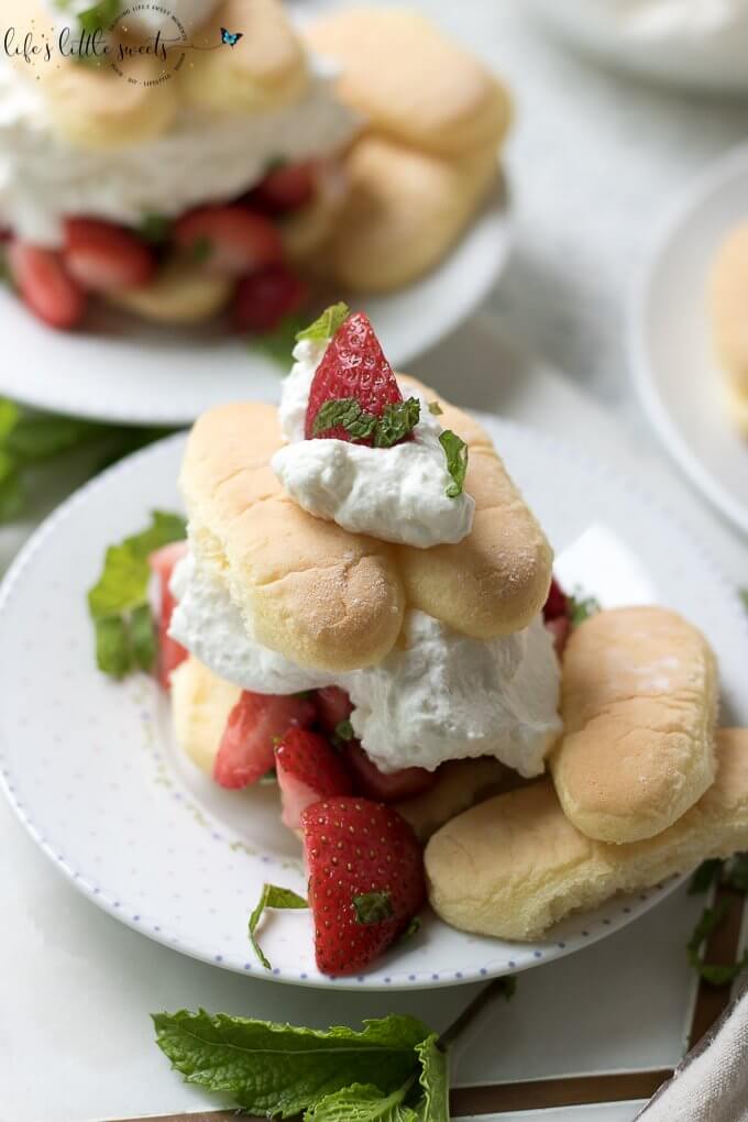Strawberry Mint Shortcake with Ladyfingers is a no bake, easy to assemble strawberry shortcake recipe with macerated fresh mint and strawberries, homemade vanilla whipped cream and ladyfinger sponge cakes. #ladyfingers #strawberryshortcake #shortcakes #mint #ladyfingers #cake #sugar #dessert #recipe