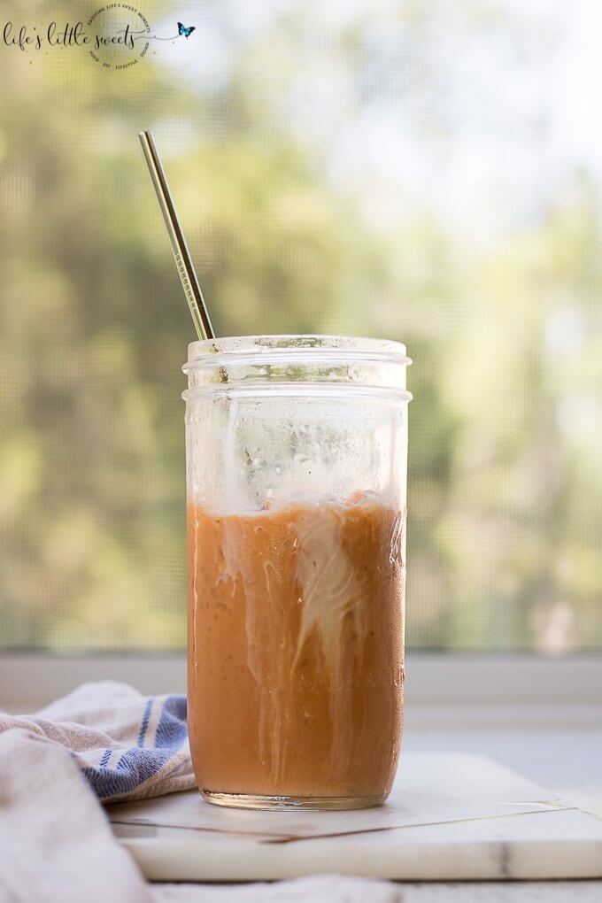 Thai Iced Tea is a strongly-brewed, smokey, black Thai tea, brewed hot, mixed with sugar (optional), sweetened condensed milk & evaporated milk and then quickly chilled by pouring over crushed iced, you can add more evaporated milk to add to it's creaminess before enjoying. #authentic #Thai #Thaiicedtea #blacktea #colddrink #sweetenedcondensedmilk #evaporatedmilk #sugar