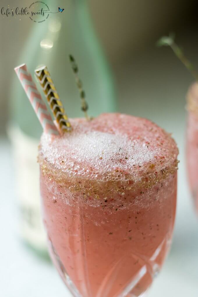 Frosé (Frozen Rosé Wine) - Treat yourself to this frozen Rosé wine recipe complete with fresh mint, fresh squeezed lemon juice, blended with crushed ice. #rose #wine #slush #mint #lemonjuice #ice #cocktail #sweet