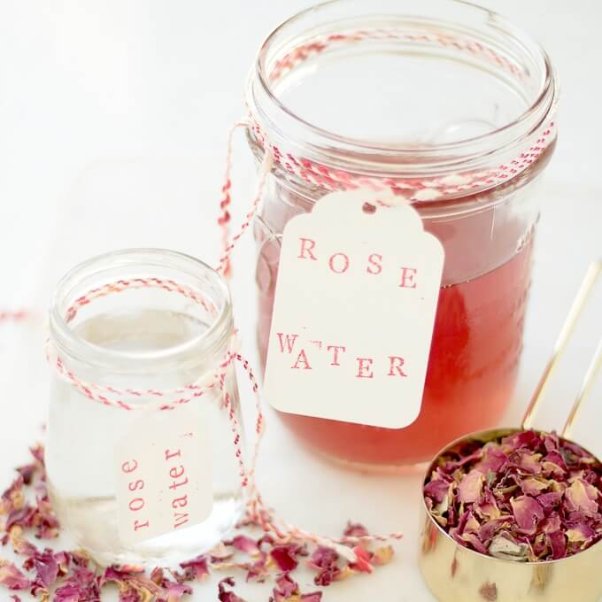 How to Make Rosewater - you can make this beautiful, delicately floral-scented rose water for cooking, beauty products and an infinite number of DIYs. (heat and steam method) #vegan #glutenfree #driedrosepetals #rose #roses #rosewater #tutorial