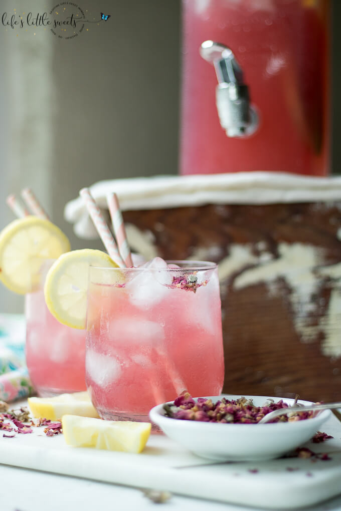 This Rosewater Lemonade is a thirst-quenching classic lemonade recipe with a fragrant and floral twist. Try this unique and beautiful lemonade for your next gathering! #rosewater #lemonade #drink #rose #roses #lemons #lemon #beverage #recipe #sweet