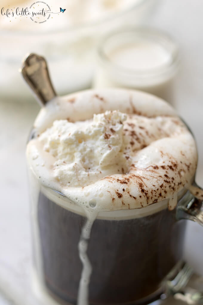 Coffee with Whipped Cream (hot and cold) is a sweet and creamy way to enjoy coffee. Your favorite coffee topped with fluffy, homemade vanilla whipped cream! #coffee #whippedcream #icedcoffee #sweet #hotcoffee #cinnamon #sugar #drink #beverage
