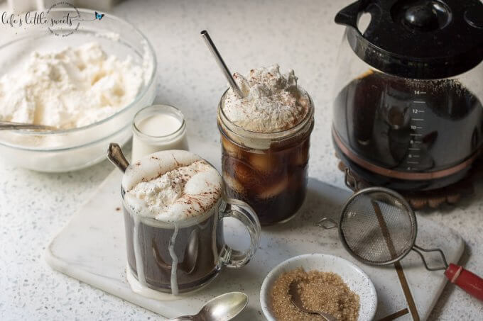 Coffee with Whipped Cream (hot and cold) is a sweet and creamy way to enjoy coffee. Your favorite coffee topped with fluffy, homemade vanilla whipped cream! #coffee #whippedcream #icedcoffee #sweet #hotcoffee #cinnamon #sugar #drink #beverage