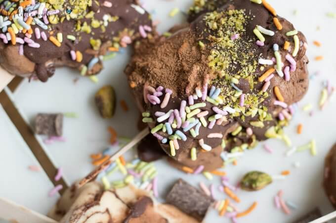 Easy Non-Dairy Ice Cream Pops can be made in minutes and are decorated with homemade chocolate shell, sprinkles and pistachios. #ad #AnIceCreamForThat #TheresAnIceCreamForThat #CollectiveBias #pops #icecream #pistachios #sprinkles #chocolate #chocolateshell #nondairy