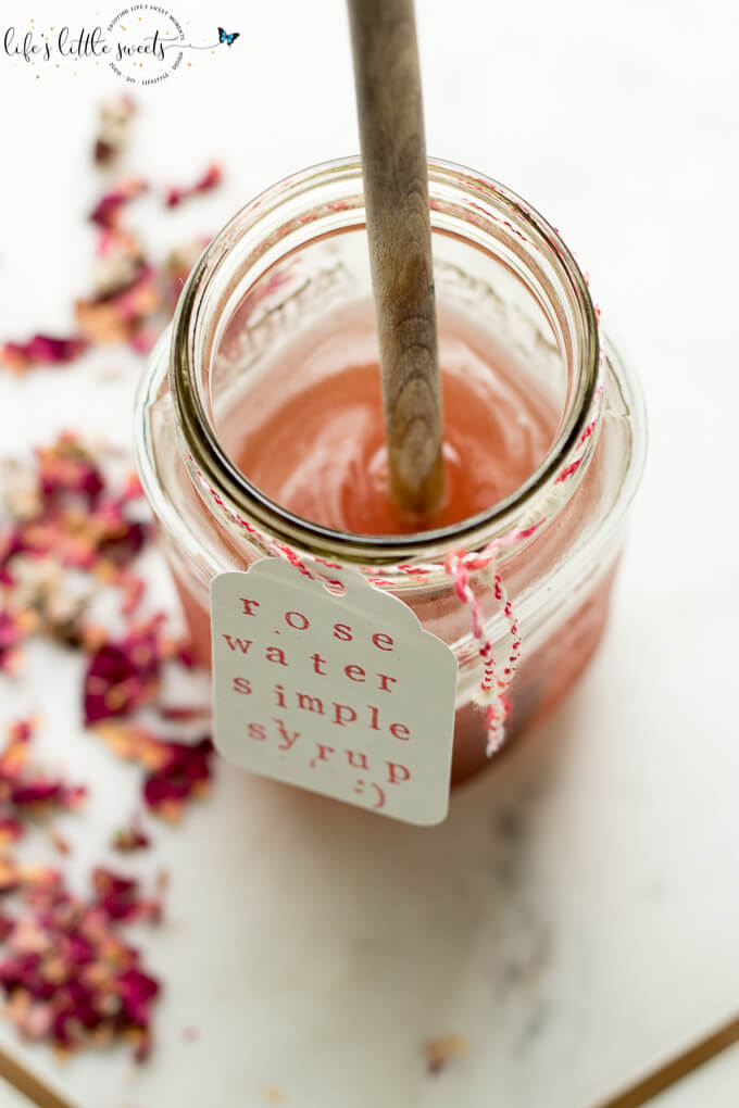 Rose Water Simple Syrup is a sweet, rose-scented syrup that you can add to mix drinks and other recipes. #rose #rosewater #simplesyrup #sugar