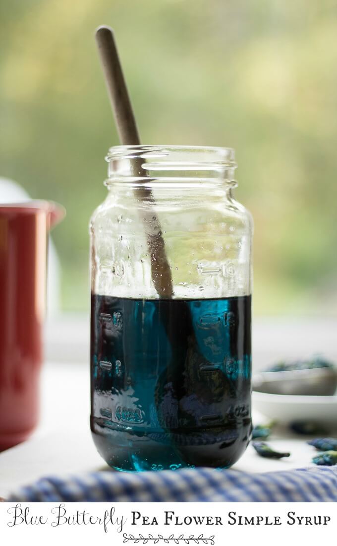 This Blue Butterfly Pea Flower Simple Syrup Recipe is a sweet and delicious base for any iced drink or cocktail recipe. It has brewed Blue Butterfly Pea Flower tea mixed with sugar to make a sweet syrup. If you add citrus to it, it turns from deep blue to bright pink before your eyes! #peaflower #simplesyrup #sugar #bluebutterfly #ingredients #drinks #driedpeaflowers