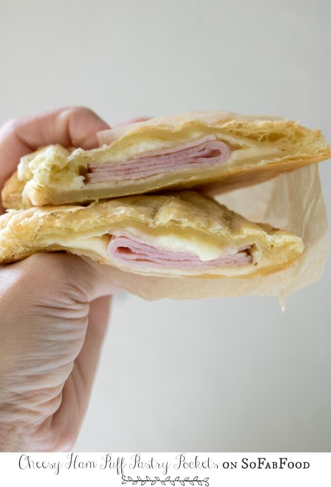 Cheesy Ham Puff Pastry Pockets on SoFabFood - These 3-ingredient Cheesy Ham Puff Pastry Pockets are perfect for easy school lunches or after-school snacks. These tasty hand pies are delicious hot or cold, your kids will love them, and they only take 20 minutes to make! #ad #sofabfood @sofabfood