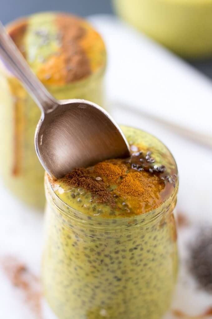 Chrysanthemum Golden Milk Chia Pudding has turmeric, cinnamon, fresh ginger and is infused with dried chrysanthemum flowers. It's a comforting, spiced take on chia pudding and goes great with a drizzle of honey or maple syrup on top! #chiapudding #breakfast #goldenmilk #Chrysanthemum