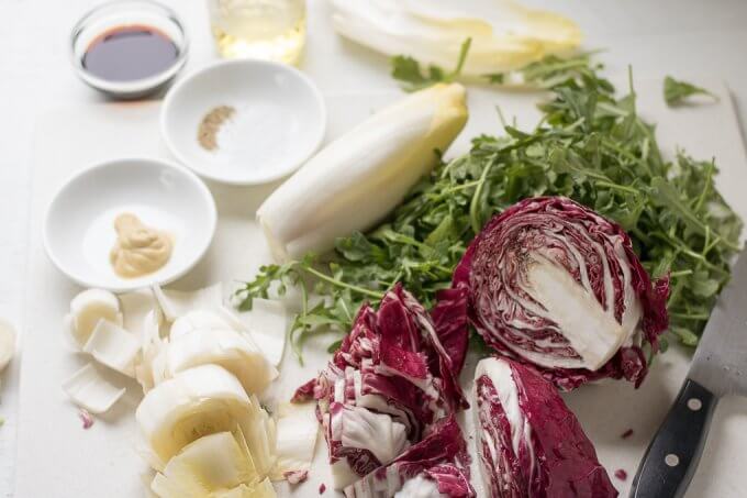 This Tri Color Salad (Three Color Salad, Insalata Tri Colore) has fresh Belgian endive, radicchio and baby arugula with a light Dijon balsamic vinaigrette. It pairs nicely with Michael Angelo's Chicken Bruschetta Meal Starter for an easy dinner! #ad #MichaelAngelosMeals #KitchenCraftedItalian #CollectiveBias @walmart @magourmetfoods