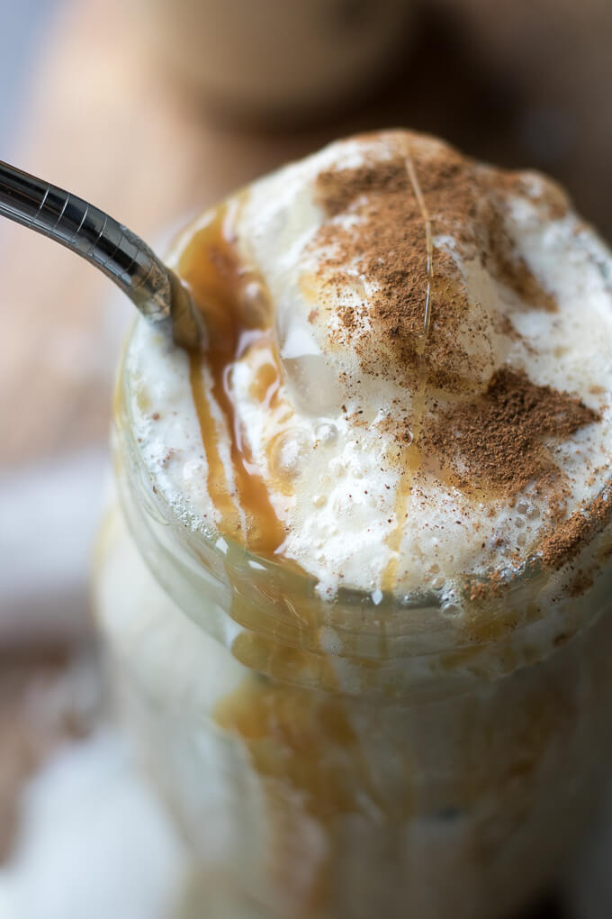 This White Chocolate Caramel Caffè Mocha is a sweet, spiced espresso drink that can be enjoyed hot or iced, perfect for cool Winter months when you need a warm drink or hot weather when you need a refreshing pick-me-up. This recipe has Torani White Chocolate and Caramel Sauces for a sweet and flavorful taste! #ad #ToraniSauceObsession #collectivebias @walmart #mocha #caffemocha #coffee #espresso #cinnamon #whitechocolate #caramel #hot #iced #drink #recipe