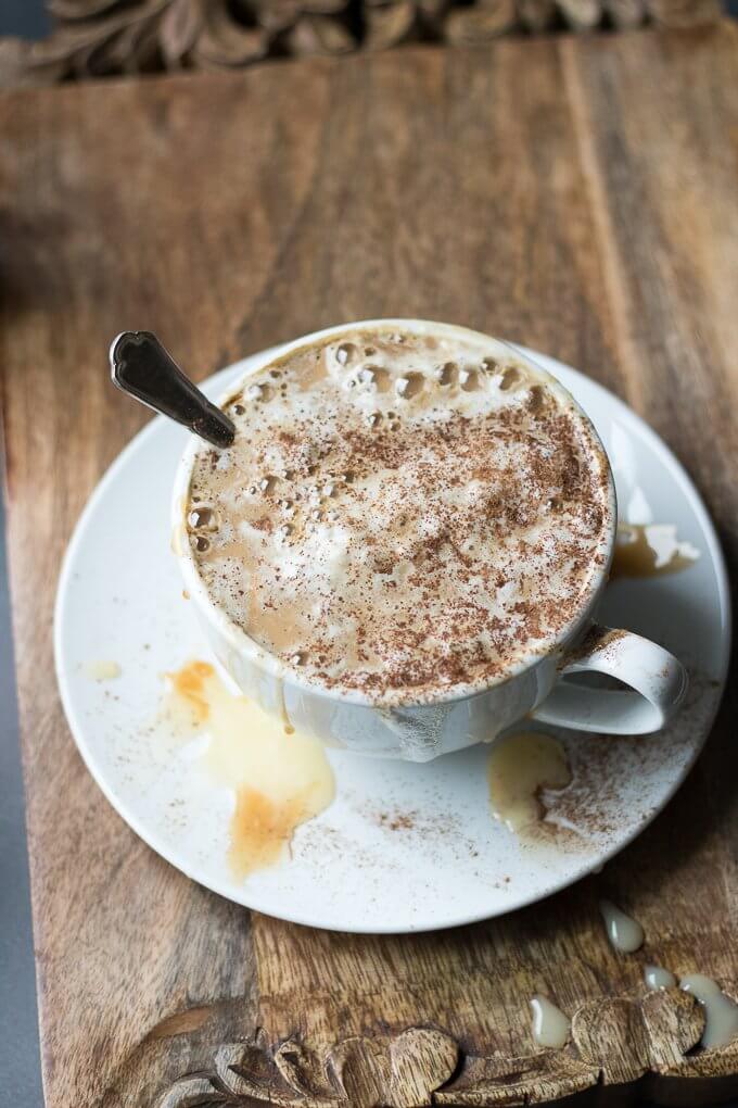 This White Chocolate Caramel Caffè Mocha is a sweet, spiced espresso drink that can be enjoyed hot or iced, perfect for cool Winter months when you need a warm drink or hot weather when you need a refreshing pick-me-up. This recipe has Torani White Chocolate and Caramel Sauces for a sweet and flavorful taste! #ad #ToraniSauceObsession #collectivebias @walmart #mocha #caffemocha #coffee #espresso #cinnamon #whitechocolate #caramel #hot #iced #drink #recipe