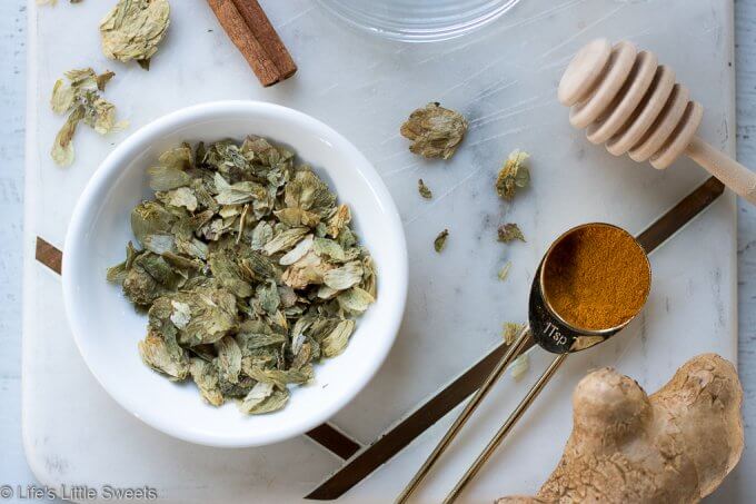 Hops Golden Milk ingredients on a white kitchen surface