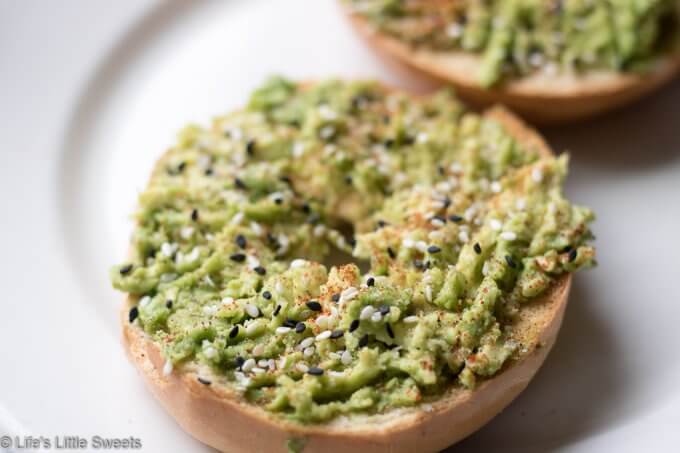 This Avocado Bagel Toast on a white plate