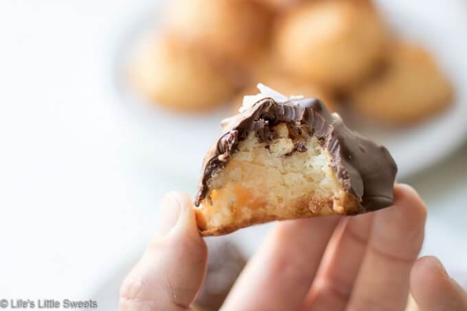 This is classic Coconut Macaroons cookie recipe has the option to be dipped in dark chocolate and sprinkled with sea salt crystals.  #coconutmacaroons #coconut #darkchocolate #cookies #seasalt #sweetenedcondensedmilk #sweetenedcoconutflakes 
