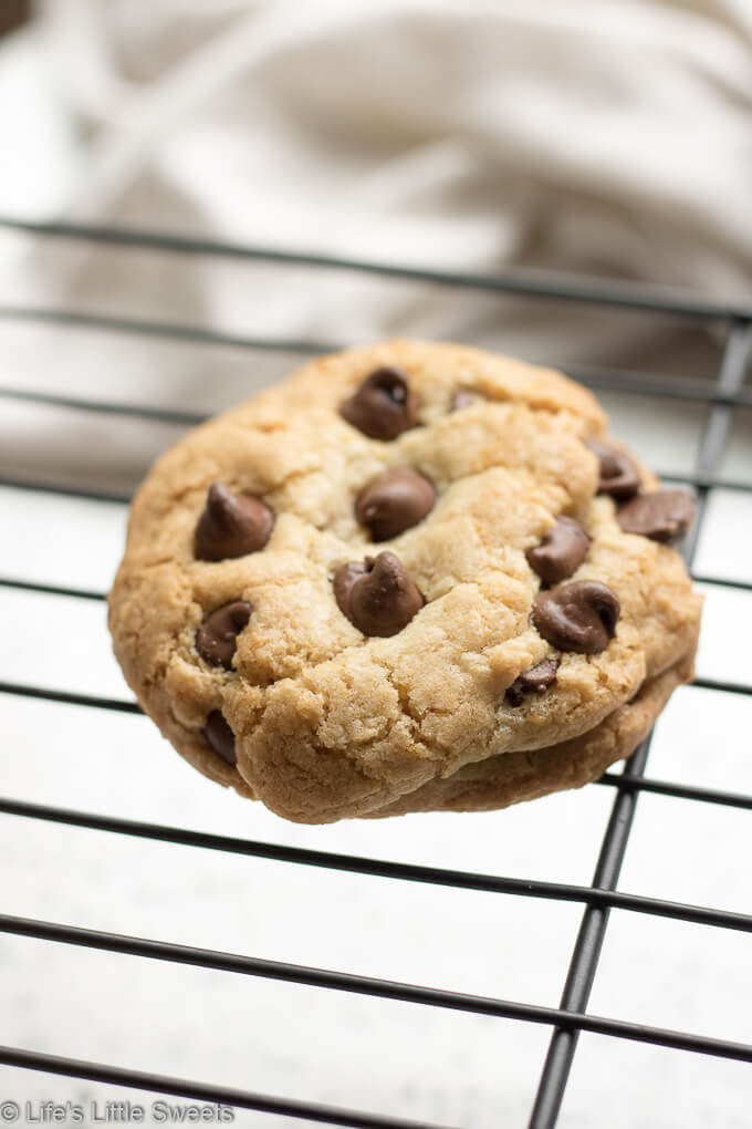 These Gluten Free Chocolate Chip Cookies are tall, soft inside with a crisp edge. Perfect for when you have a Chocolate Chip Cookie craving but don't want or can't have flour - you won't miss the flour once you taste these delicious cookies!  #cookies #glutenfree #bobsredmill #chocolate #cookies #chocolatechip #dessert #sweet #glutenfreeflour