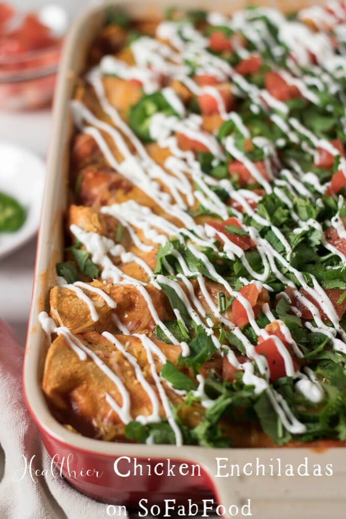 Healthier Chicken Enchiladas on SoFabFood - With the help of weekly meal prep, these Healthier Chicken Enchiladas are a 30-minute meal perfect for a busy weeknight dinner. Using just a few healthy ingredient swaps, this lightened up version of a traditional comfort food is simple, yet fancy enough for entertaining dinner guests. #ad #sofabfood @sofabfood #healthier #healthy #chicken #enchiladas
