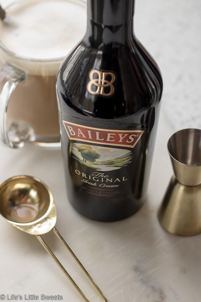 (MSG 21+) Irish Coffee is a alcohol-infused coffee drink, with Baileys Irish Cream and Irish Whiskey. This is a warming coffee drink perfect a cold day and/or to serve for brunch. #irishcoffee #Irishwhiskey #whiskey #BaileysIrishCream #cream #Stpatricksday #drinks #coffee