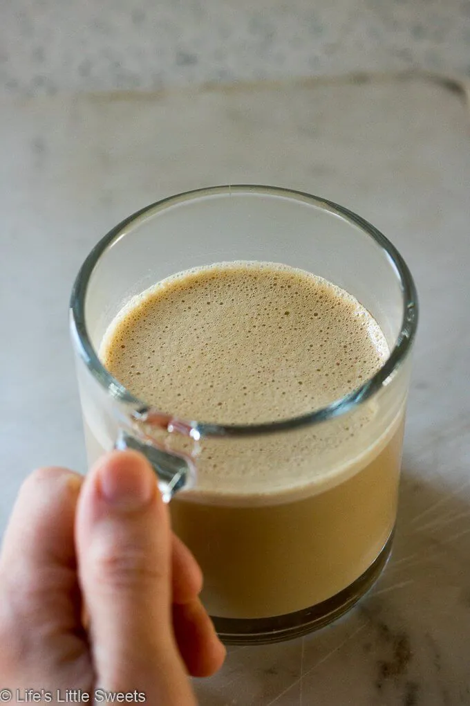 This Keto Butter Coffee Recipe is a satisfying, frothy & creamy cup of coffee, perfect to have in the morning. It's hot coffee blended with ghee (grass-fed, clarified butter) and MCT oil (medium-chain triglyceride extracted from coconut oil). #keto #buttercoffee #bulletproofcoffee #ketocoffee #recipe #MCToil #coconutoil #ghee #glutenfree #vegetarian #nocarb #nocarb #coffee #paleo