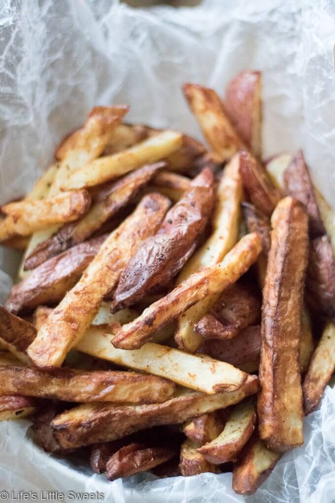 a close up of fries in a bowl