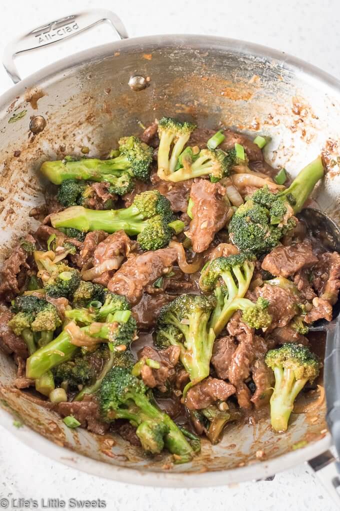 Homemade Beef and Broccoli over Brown Rice is a savory, stir-fry dish that has thin-cut strips of lean, flank steak, crisp, bite-size, broccoli florets, a savory, garlic-infused brown sauce over steaming hot, brown rice. Make this popular Chinese-American cuisine take-out dish at home! #beef #broccoli #brownrice #dinner #ChineseAmerican #takeout #homemade #recipe 