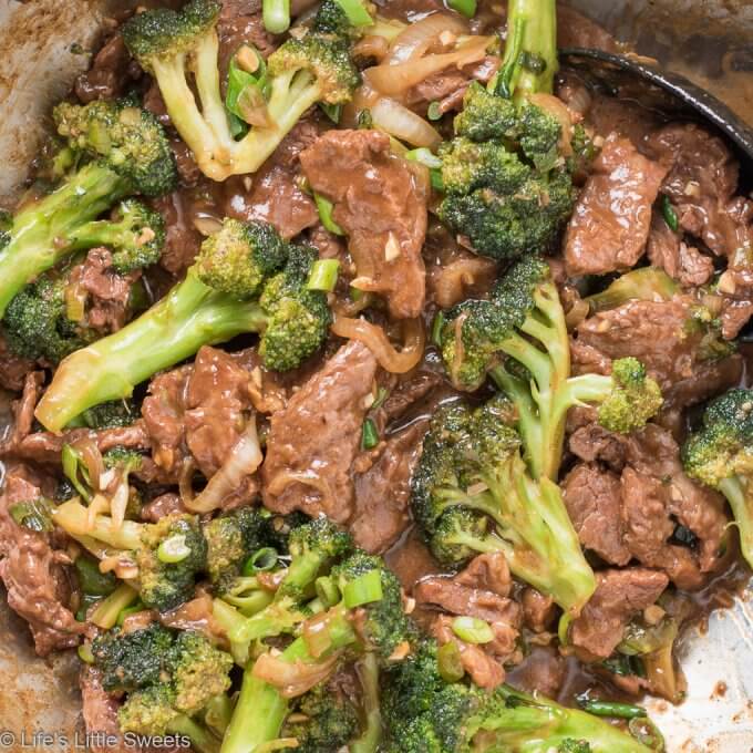 Homemade Beef and Broccoli over Brown Rice is a savory, stir-fry dish that has thin-cut strips of lean, flank steak, crisp, bite-size, broccoli florets, a savory, garlic-infused brown sauce over steaming hot, brown rice. Make this popular Chinese-American cuisine take-out dish at home! #beef #broccoli #brownrice #dinner #ChineseAmerican #takeout #homemade #recipe 