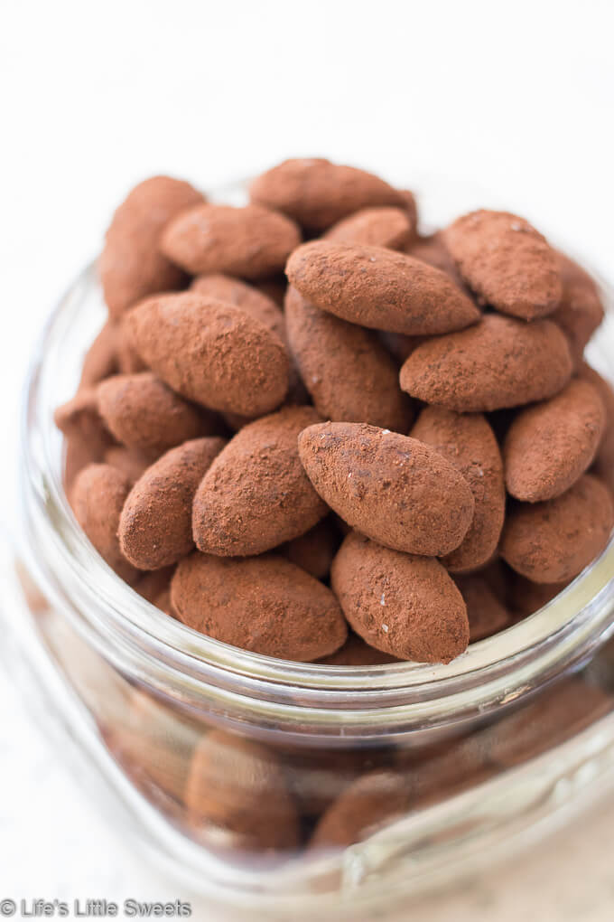 Cocoa Almonds in a mason jar with a white background