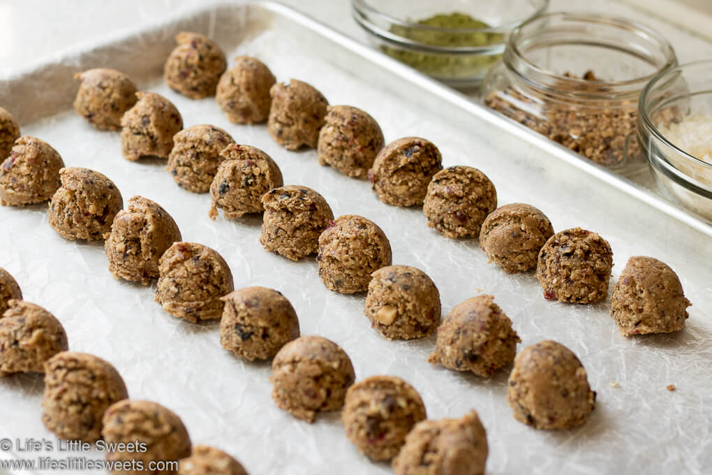 Peanut Butter Energy Bites are an easy savory-sweet snack recipe that has Windstone Farms Peanut Butter, trail mix, chocolate, coconut flakes, match tea powder, oatmeal and is naturally sweetened with pure maple syrup and wildflower honey. (makes about 35 energy bites, vegan option, gluten-free) #glutenfree #veganoption #peanutbutter #energybites #recipe #snack #coconut #matchateapowder #WindstoneFarmsPeanutButter #ad #WindstoneFarmsPB #CollectiveBias @windstonefarms @walmart