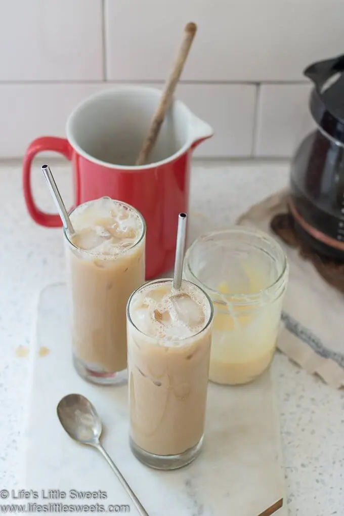 looking down on Sweetened Condensed Milk Iced Coffee with a red pitcher lifeslittlesweets.com