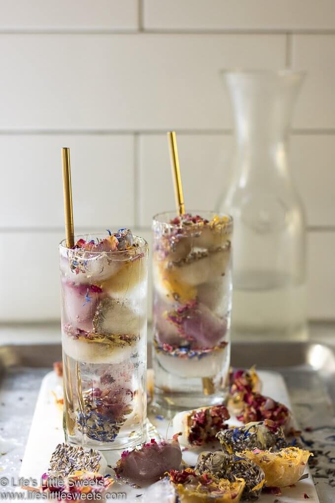 Flower Ice Cubes make any cold drink a whole lot “extra” – make water, sparkling drinks, wine, cocktails, mocktails, iced coffee and tea floral and beautiful. Great serving idea for entertaining and parties! #flowers #ice #icecubes #bmaker @bmaker #drinks #entertaining #cocktails #mocktails #iceddrinks #ad