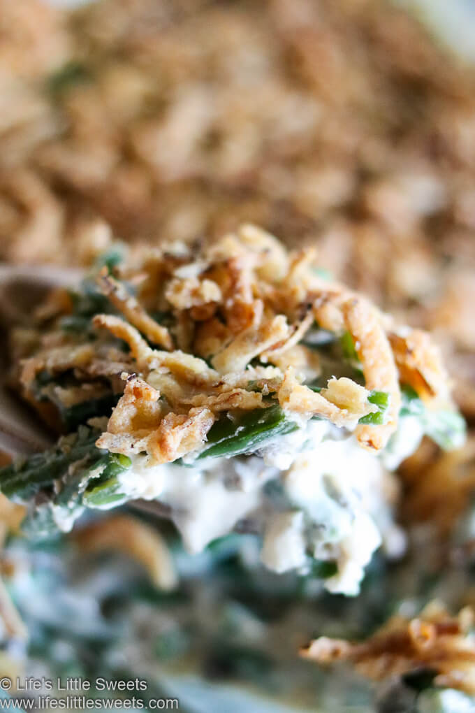 Green Bean Casserole being lifted out of the pan